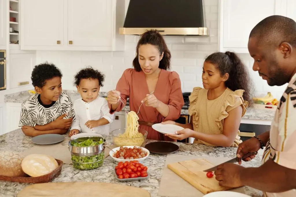 Family sharing a home-cooked meal around the kitchen table